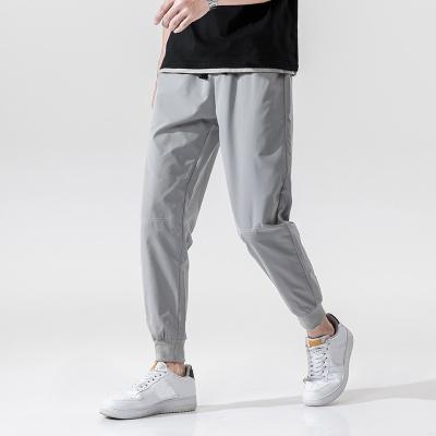 China high quality printing Anti-wrinkle embroidery anti-wrinkle elastic waitst sweat sports pants men for sale