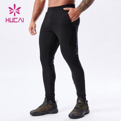 China HUCAI Breathable Custom Sweatpants Slim Fit Mens Gym Joggers Sports Fitness Track Pants Men Jogger With Side Pockets for sale