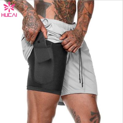 China Custom Mens Sports Polyester Breathable Shorts With Linner Mens Activewear Mens Workout Shorts With Pocket for sale