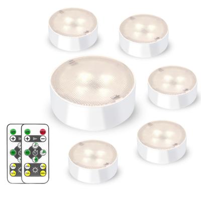 China New Design Modern LED Wireless Puck Light Battery Puck Light Cabinet With Remote Control Night Light for sale