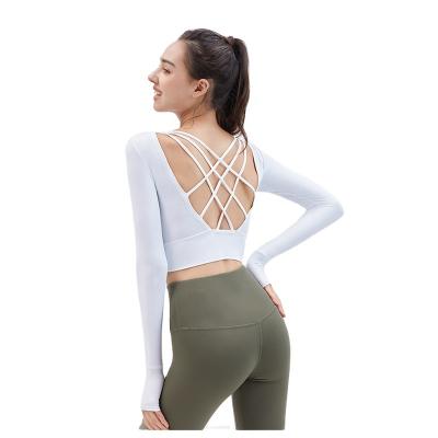 China New Design Breathable Women Nylon Fitness Yoga Wear Hollow Out Long Sleeve Yoga Tops Bare Back Sexy Gym Shirts Padded Slim Premium Bra Top for sale