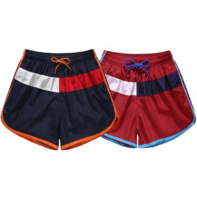 China Source Factory Supply Breathable Beachwear Men Color Patch Beach Shorts Quick Dry Swim Trunks Above Knee Length Solid Color Contrast for sale