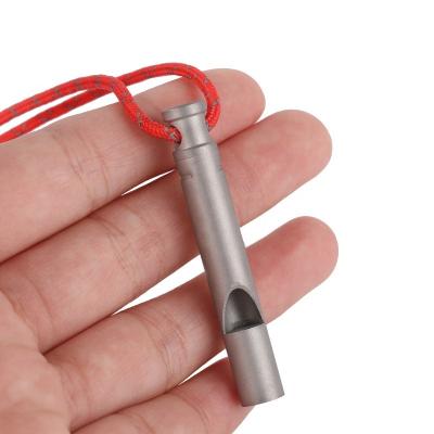 China Lightweight Cheap Custom Metal Titanium Sports Whistle With Rubber Tip And Lanyard for sale