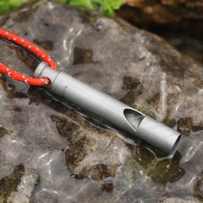 China Spot Light Goods Wholesale Cheap Flat Titanium Whistle Life Jacket Whistle for sale