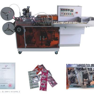 China BTS-68 Aluminum Foil Condom Packing Machine Chemical Automatic Condom Wrapping Machine for sale