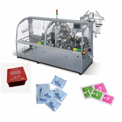 China Automatic Food Glove Folding Packaging Machine Four Side Bag Sealing Packing Machine for sale