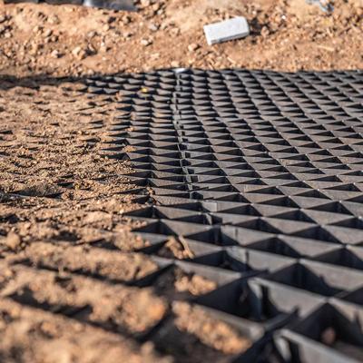 中国 HDPE Gravel Grid Material System Driveway Textured Geocell For Road Reinforcement Grass Net Paving 販売のため