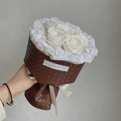 China Factory Wholesale Waterproof Flower Wrapping Decorative PU Leather Gift Bouquet Wedding Wrapping Paper for sale