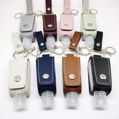 China Mini Tassels Portable Gel 30Ml Travel PU Leather Sanitzer Holder Wholesale Custom Bottle UV Sanitizing Hand Key Chain for sale