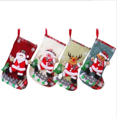 China 4 Designs Christmas Tree Ornaments Canvas Gift Candy Sack Christmas Stocking Decoration For Kids for sale