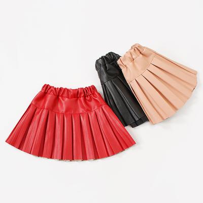 China 2020 New Kids Big Girl Cute Pu Leather Pleated Red Skirt Winter Breathable Skirt For 4-8T 5pcs/lot for sale