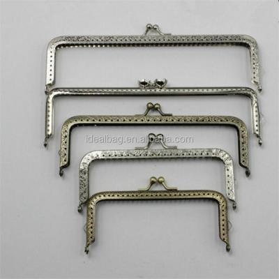 China Kiss Lock Metal Clasp Purse Frame with Holes Shape Kiss Lock Metal Screw Purse Clutch Bag Metal Clasp Purse Frame for sale