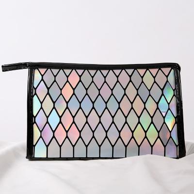 China Waterproof Holographic Cosmetic Toiletry Bag Geometric PVC Clutch Travel Fashion Makeup Cosmetic Pouch for sale