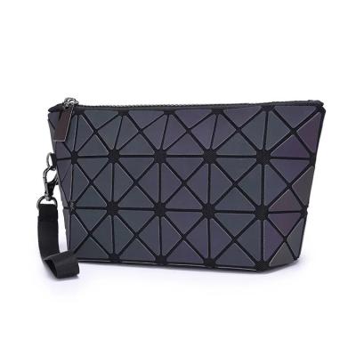 China Noctilucent Luminous Geometric Shape Waterproof Cosmetic Bag Shell Fashion Makeup Bangle Pouch for sale