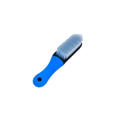 China Durable High Strength Anti-Slip Silicone Covered Handle PP Wavy Plastic Hair Household Brush for sale