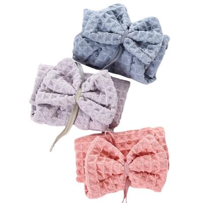 China Wholesale Viable Solid Color Absorbent Bow Towel Hand Kitchen Waffe Hanging Towel for sale