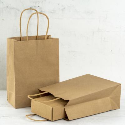 China Recycled materials rts kantong kertas 2.54 * 1.27*3 party goods shopping paper bag. 3cm Yellow Custom Paper Retail Packaging With Logo for sale