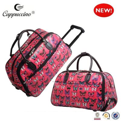 China TOGGLE BAG new fashion girl canvas fabric oil print butterfly print kids rolled trolley school bag for sale