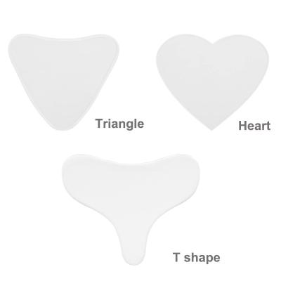 China Waterproof T Shape Soft Silicone Reusable Chest Protector OEM Anti-Wrinkle Clear Self Adhesive Silicone Pads For Decollete for sale