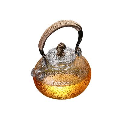 China Factory Direct Selling Viable Heat Resistant Hand Teapot Borosilicate Glass Tea Set Metal Handle Health Care Blowing Pot for sale