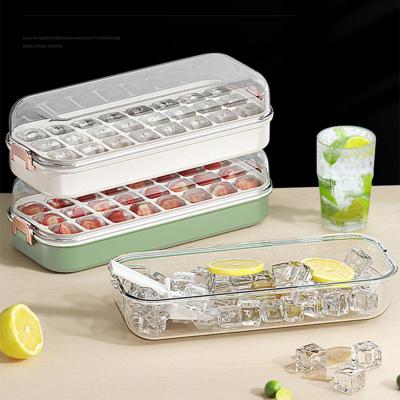 China Durable Easy Press Release Ice Cube Trays Mold With Lid Pressure Plate Ice Cube Tray Storage Ice Maker With Lid And Bin for sale