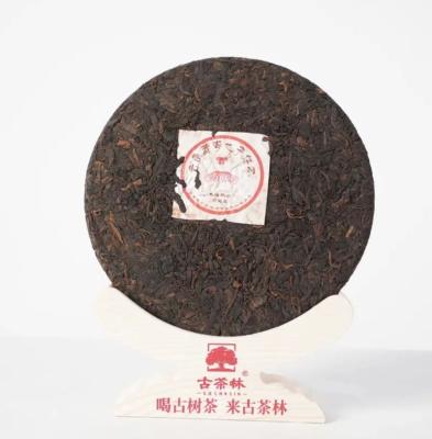 China Yunnan Cake Compressed Tea Special Promotion Cooked Tea With Best Performance Cost 357g for sale