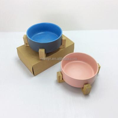 China New Unique Viable Personalized Pet Animal Pink Ceramic Serving Bowl With Wooden Stand Porcelain Lidded Mini Soup Adjustable Feeders for sale