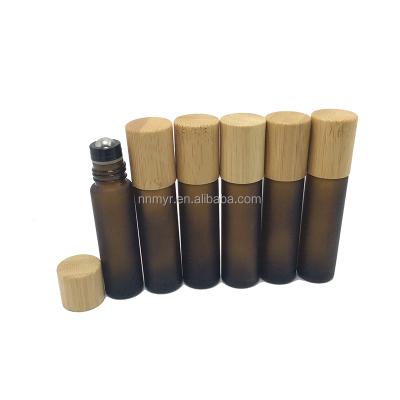 China Premium Quality Skin Care Empty Bamboo Bottle Cosmetics Body Oil Roller Bottles Crystal Wood for sale