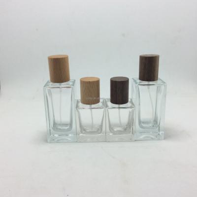 China Premium Quality Glass Bottle Bamboo Cosmetic Packaging Perfume Rose Quartz Perfume Bottle for sale