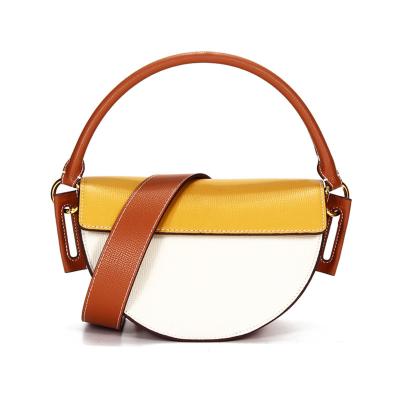 China Half Moon Bag New Arrivals Shape Color Matching Genuine Leather Half Moon Mini Saddle Bag 2021 Winter Designer Cross Body Bag For Women for sale