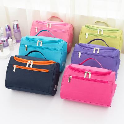 China New GS031 Waterproof Portable Solid Color Hook Boys Wash To Bag Large Capacity Girls Storage Cosmetic Bag for sale