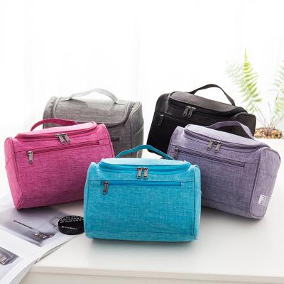 China New GS032 Solid Color Hook Wash Bag Waterproof Portable Girls Storage Cosmetic Bag Large Capacity for sale