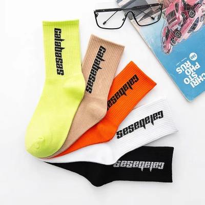 China Custom QUICK DRY Casual Jacquard Knitted Letter Crew Socks Mens Designer Cotton Brands Funny Sports Socks Wholesale for sale