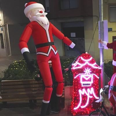 China Christmas Holiday Parade Advertising Decoration Inflatable Santa Claus On Stilts for sale