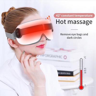 China Intelligent EYE Electric Vibration Eye Massager With Heat Compression SPA Care Music Massage Eyes for sale