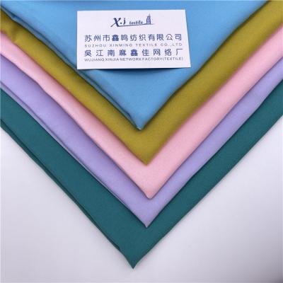 China 100% Simple High Quality Anti-static Dye Polyester Wool Peach Fabric Fashion Dress Fabric for sale