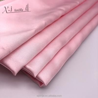 China Flame Retardant 5075 Poly Spandex Satin For Garment Stretch Satin for sale