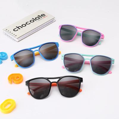 China Color Film Lenses Polarized Sports Driving Running Cycling Sunglasses For Kids for sale