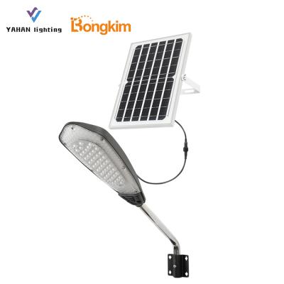 China ROAD new design with stainless steel outdoor waterproof IP65 arm 50W solar led street light for sale