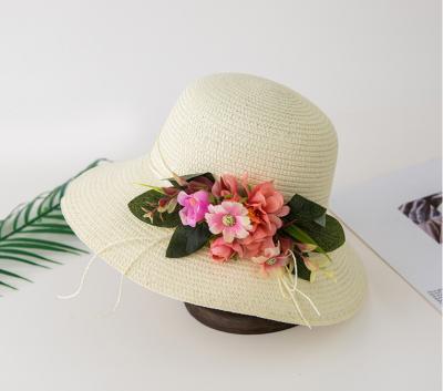 China Hot Sale Dobby Women's Beach Raffia and Straw Sun Hat Promotion Summer OEM Customized Style Sliver Adult Accessory With Flower for sale