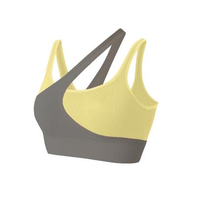 China Breathable Cross Shoulder Radio Bra Color Splice Gather Sports Bra Gym Wear Yoga Running Bra for sale