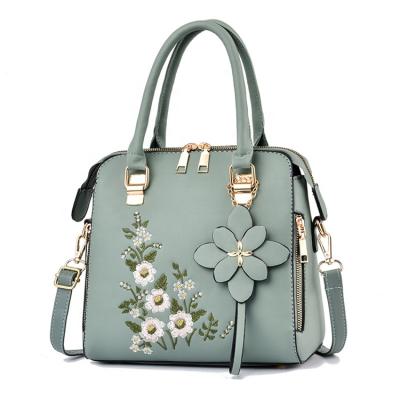 China 2021 Fashion Cute Ladies Big Shoulder Blue Floral Embroidery Designs Leather Trim Women's Handbags for sale