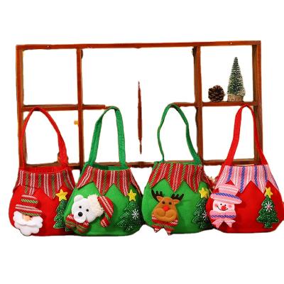 China Fashionable Christmas Gift Bag Brushed Fabric Candy Bag Gift Ornaments Santa Claus Snowman Deer Beam Beam Apple Bag for sale