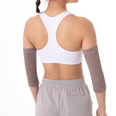 China Keep Warm Nylon Compression Elbow Support Seamless Arm Sleeve for sale