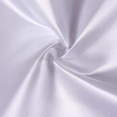 China Polyester Women Dresses Fabric 75D*300D White Shiny Satin Fabric Anti-Static for sale