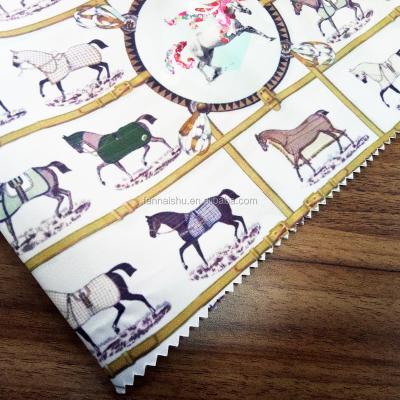 China Anti-Static 100% Polyester Horse Print Satin Fabric For Dress And Blouse for sale