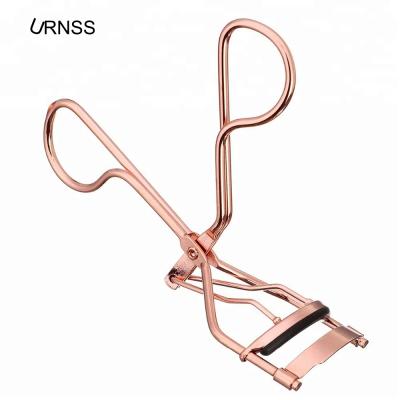 China Stainless No Pinch Rose Gold Fits All Eye Shape Professional Eyelash Curler With Silicone Pressure Refill Pads for sale