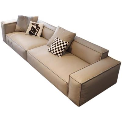 China Simple light luxury modern cowhide living room tofu sofa bed Italian leather cream style sofa for sale