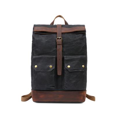 China Vintage Men Student School Backpack Waterproof Laptop Bags Waxed Canvas Genuine Leather Backpack for sale