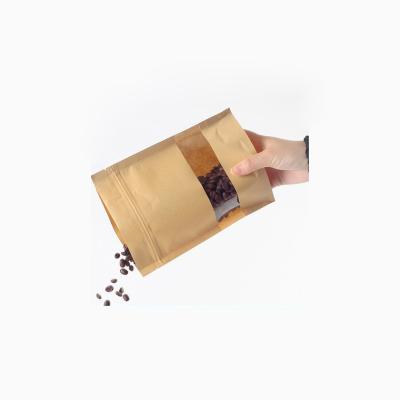 China Brown Biodegradable Kraft Stand Up Zipper Pouch With Transparent Window Paper Zipper Bag For Nuts Packaging for sale